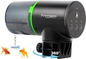 The AutoStory Automatic Aquarium Fish Feeder: Hassle-Free Vacation Feeding, Manual/Auto Modes, Portion Dispenser, 2 Fixing Options-0.05 Gal Capacity, Plastic, 14.7 X 7.1 X 11.2 Cm